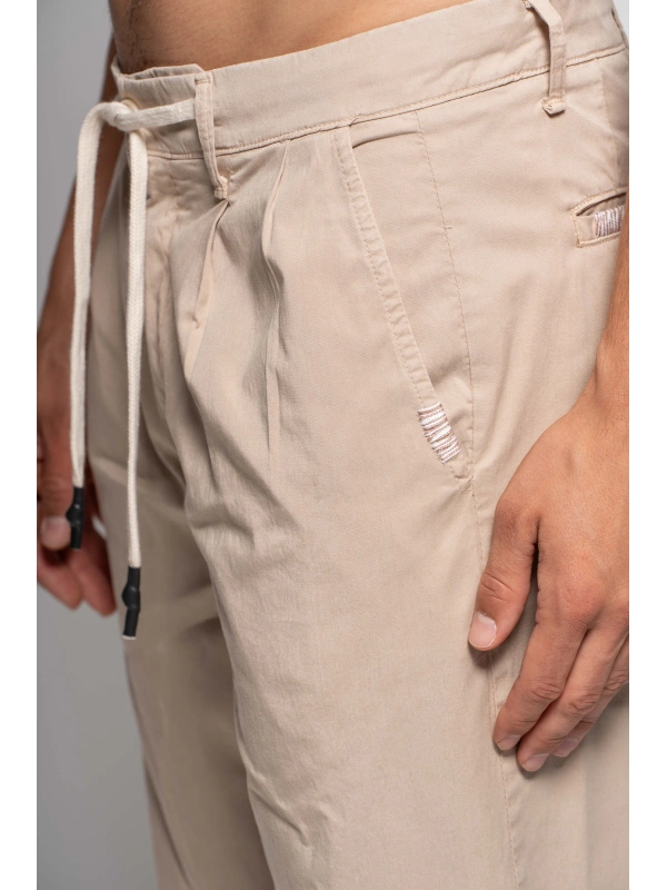 DRAWSTRING PANTS WITH MENDS